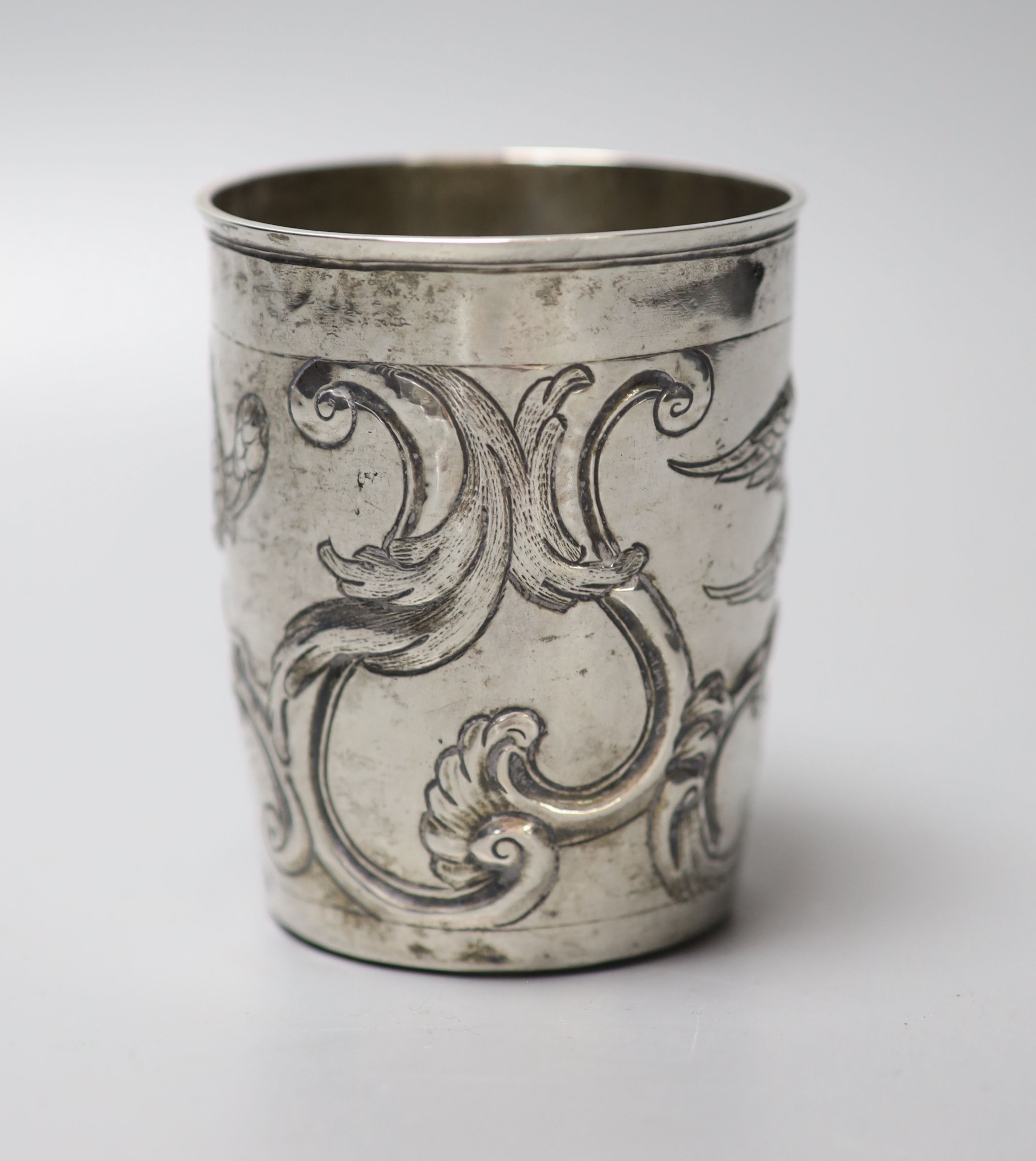 A late 18th century Russian embossed white metal beaker, assay master Alexei Viklyayev?, Moscow, 1790, 87mm, 91 grams.